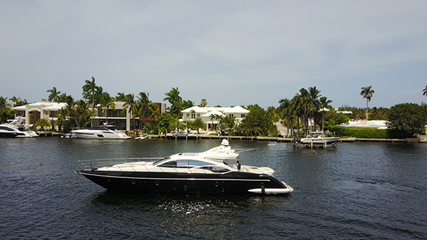 A profile view of the Black Ice - the best yacht charter in Miami. 