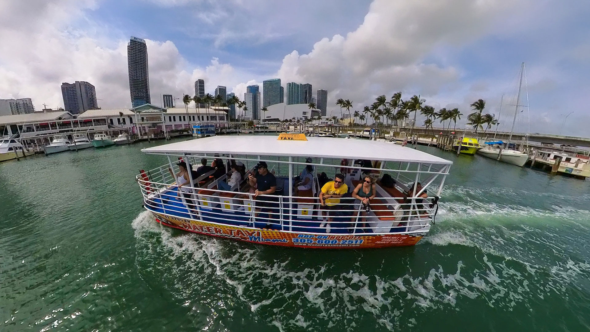 Enjoying the view from the water taxi.