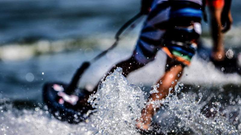 Artistic shot of someone riding a jetsurf in Destin.