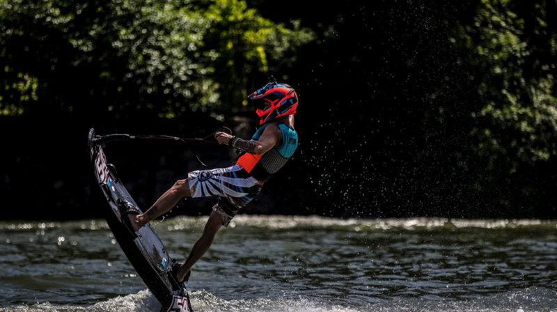 A man shreds and pops a wheelie on a Jetsurf in Destin.