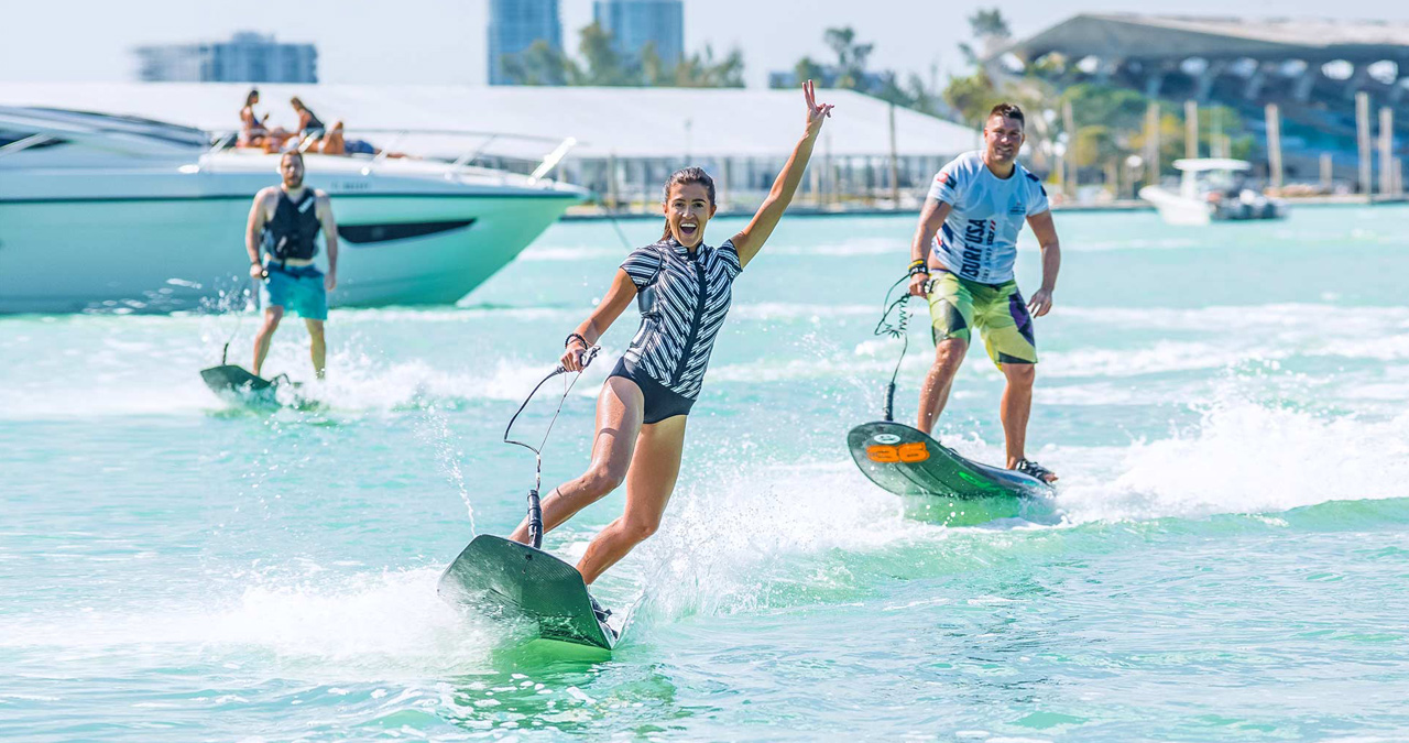 It is all fun for these jetsurf riders in Miami. 