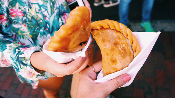 Enjoy a tasty empanada during your Little Havana food tour.