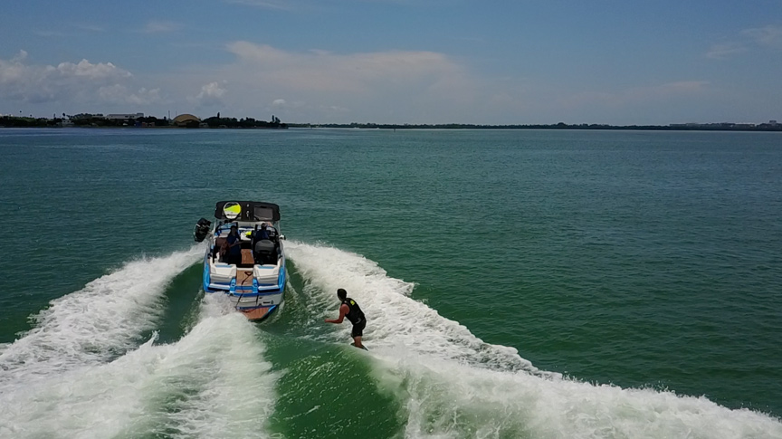 An aerial shot of a wake surfing in Biscayne Bay with Miami Wake Academy.