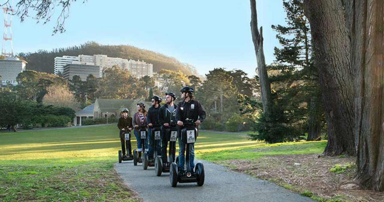 A group poses for a picture on their Segway tour of San Francisco.