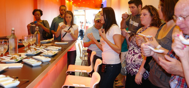A food tasting at a local eatery is all part of the South Beach Food Tour. 