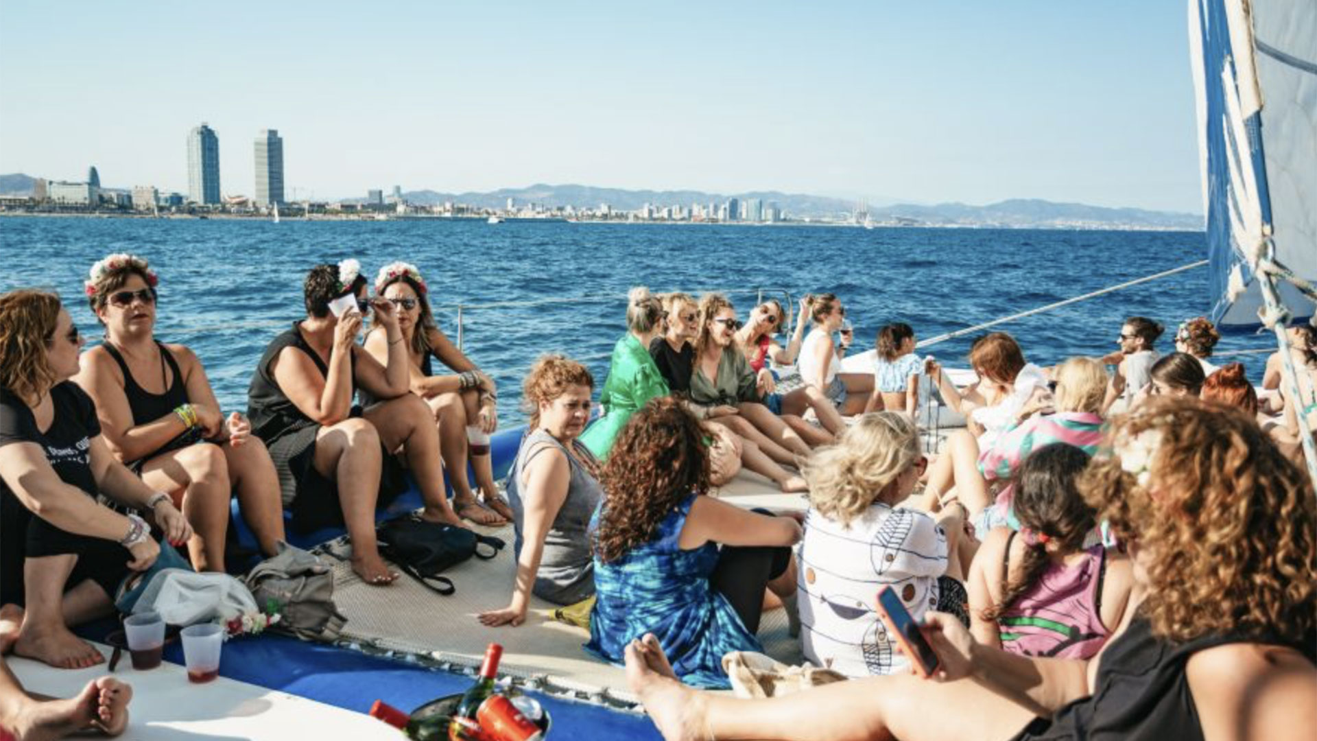 Everyone relaxes on the top of the catamaran while cruise the bay. 