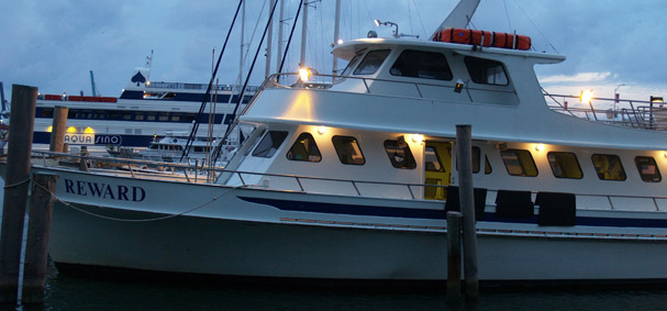 The public fishing boat is getting ready for its 8 pm departure.